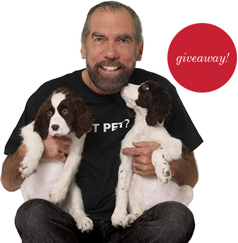 image of john paul dejoria with puppies